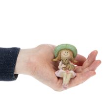 Artikel Kantenhocker Lächelndes Mädchen mit Hund Ø4,5cm H9,5cm