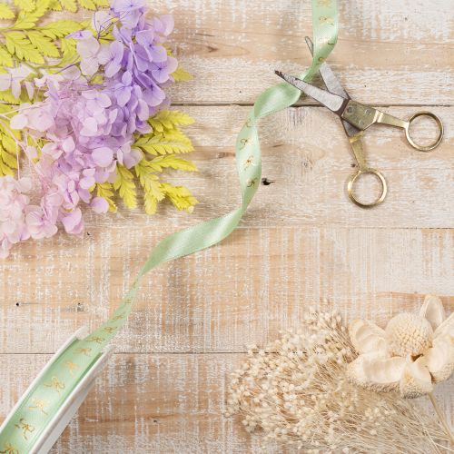 Dekoband mit goldenen Schleifen auf Rolle 15mm 18m | Floristik24.de