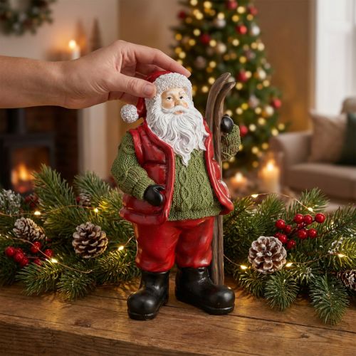 Weihnachtsmann Deko Figur mit Ski Bemalt 14×10,5×24,5cm | Floristik24.de