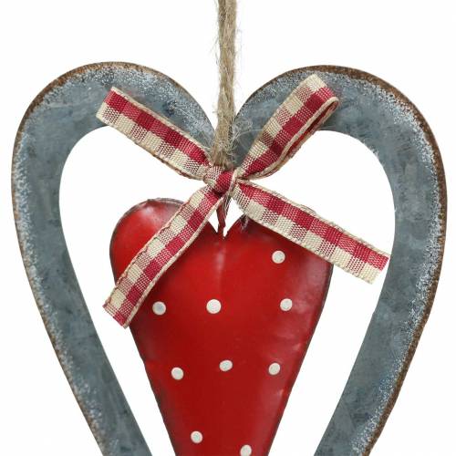 dekorativer Anhänger Herz Metallherz handbemalt rot mit cremefarbenem Muster