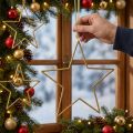 Glitzernde Goldene Deko-Sterne