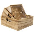 Holzkiste mit Tafel und